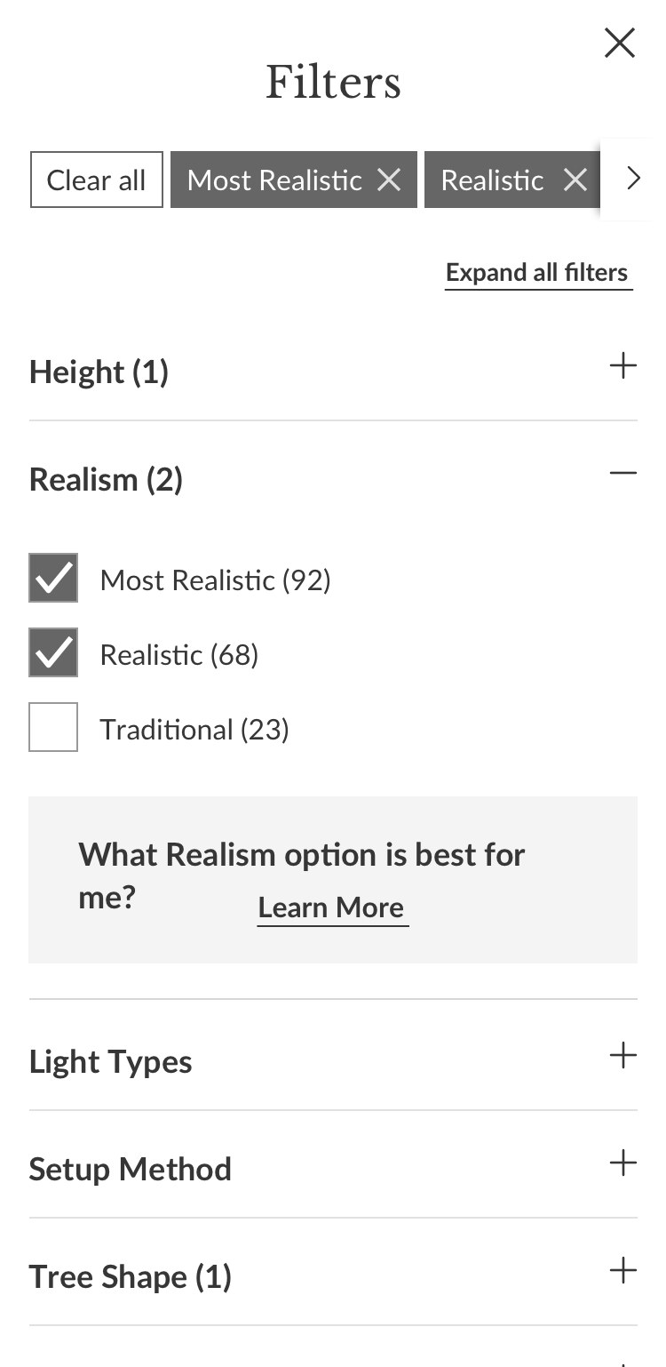 The realism filter open, with counts for most realistic, realistic, and traditional, and a prompt explaining which option to choose