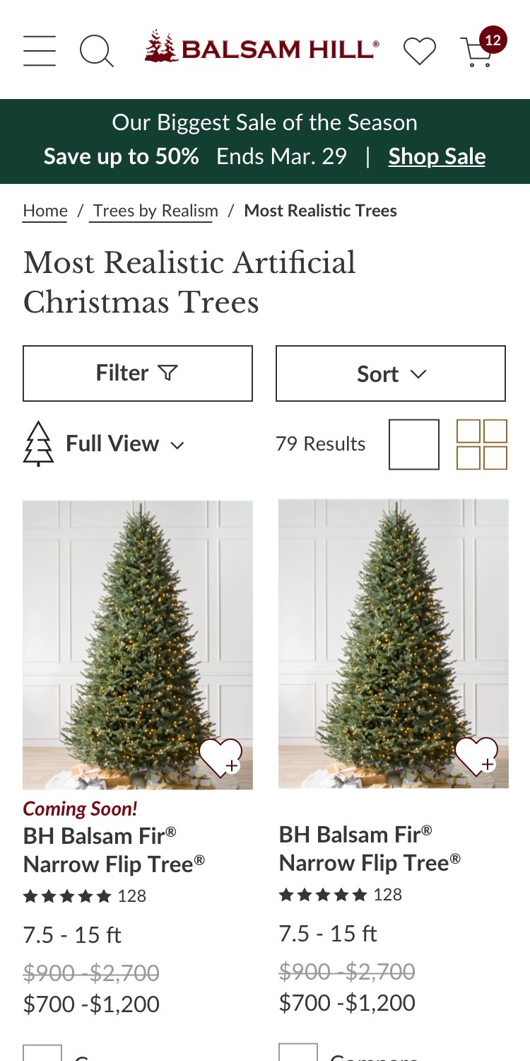Mobile product listing for most realistic artificial Christmas trees, with Filter and Sort buttons and a two-column product grid